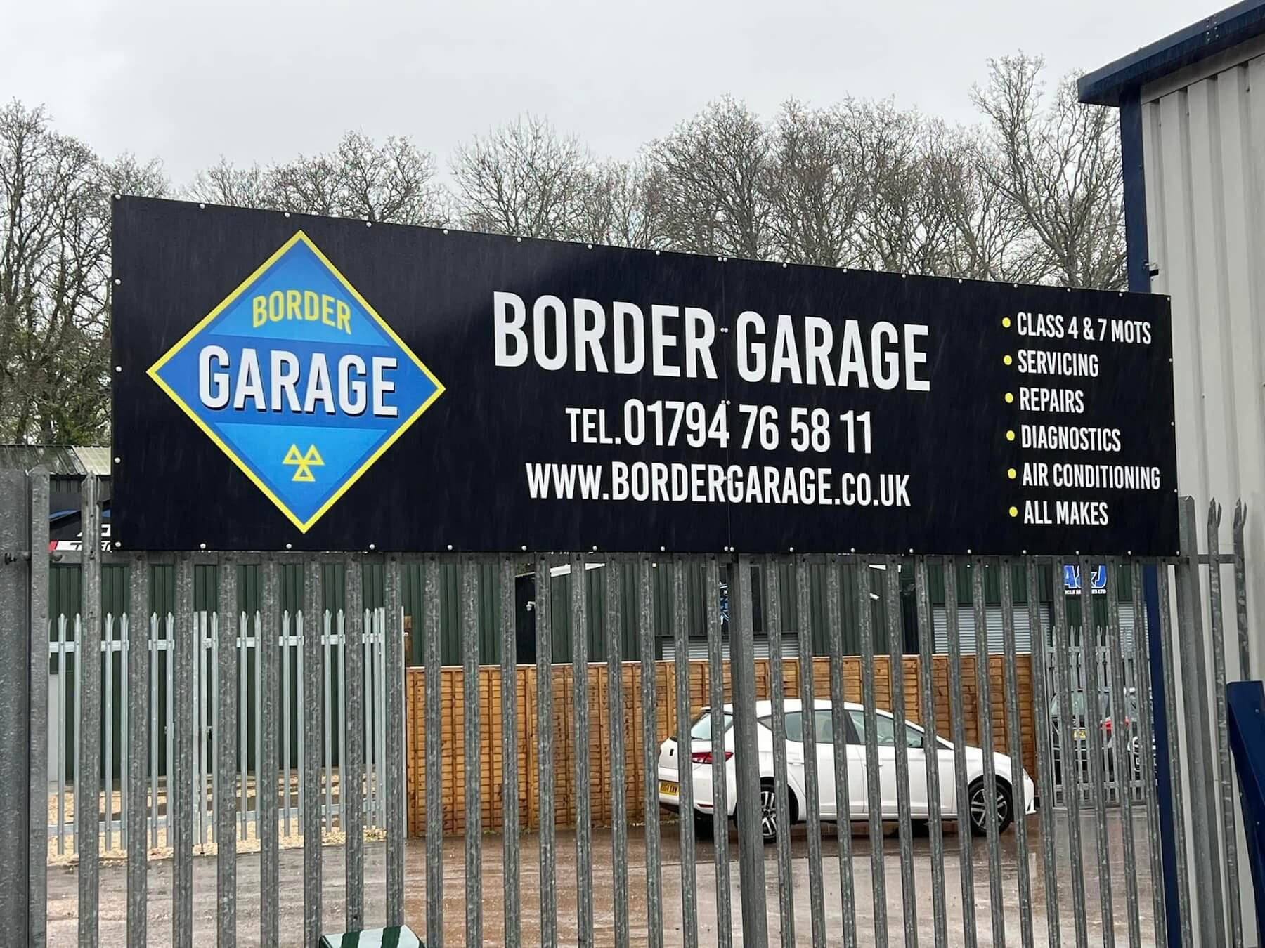 Border Garage advertisement banner at the garage in West Wellow, Romsey